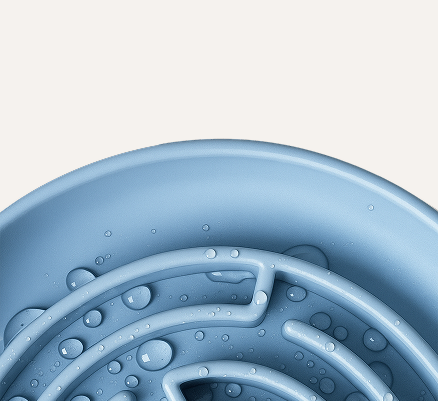 no rush bowl by chonky paws with water sprinkled on it